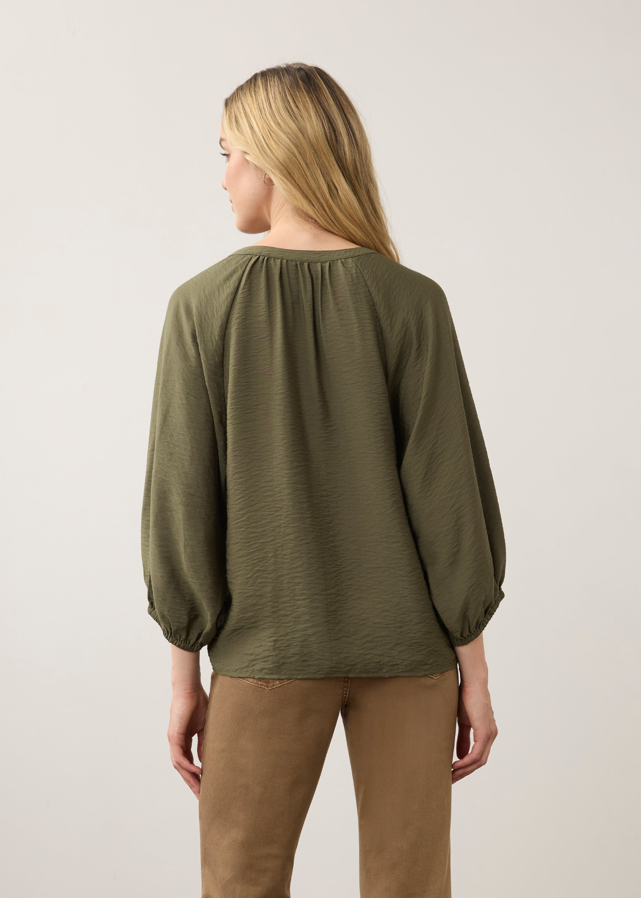Back view of olive blouse highlighting puff sleeves by French Dressing Jeans (FDJ)