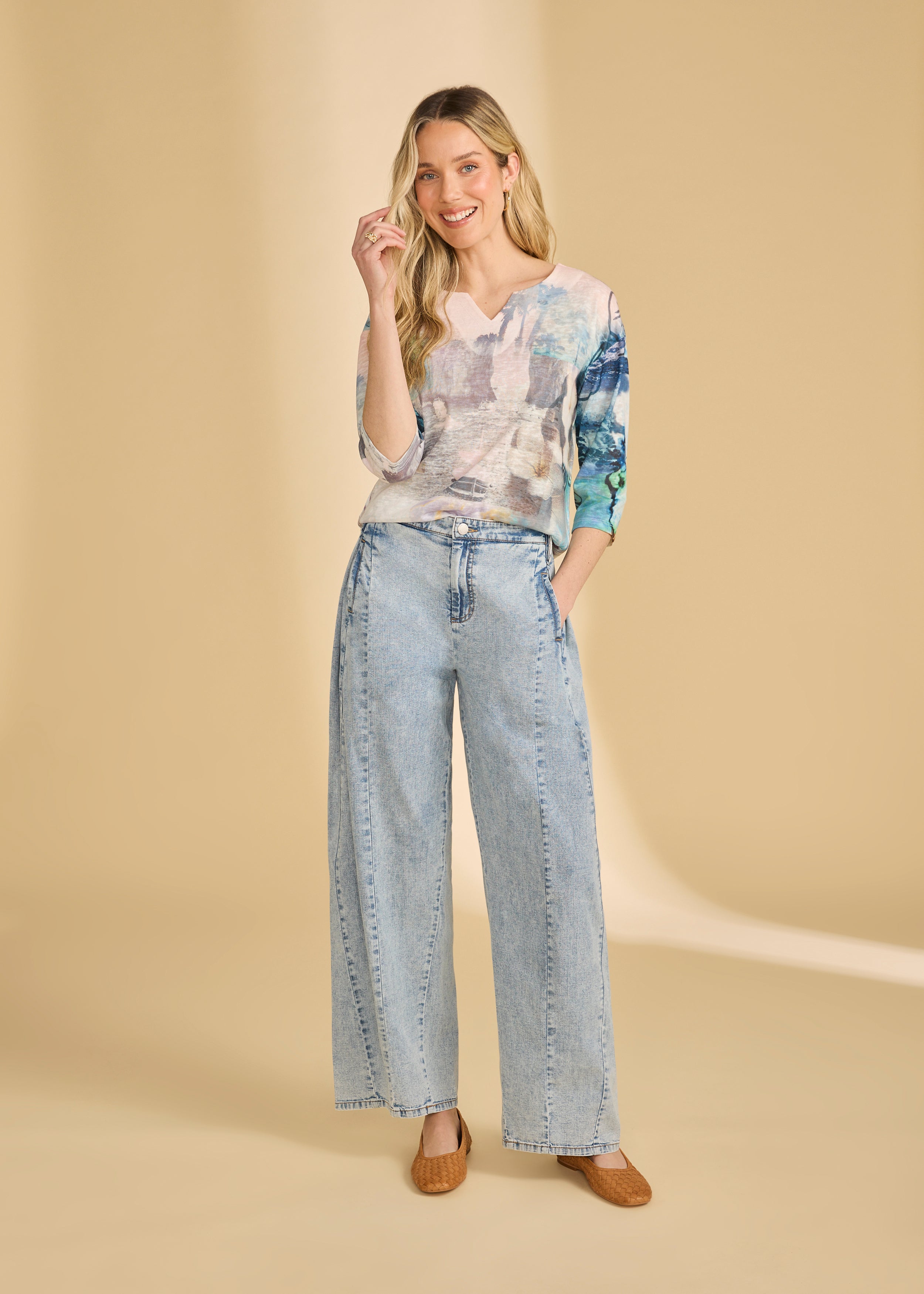 Model wearing powder wash wide leg jeans with high-rise fit showcasing full outfit by French Dressing Jeans (FDJ)