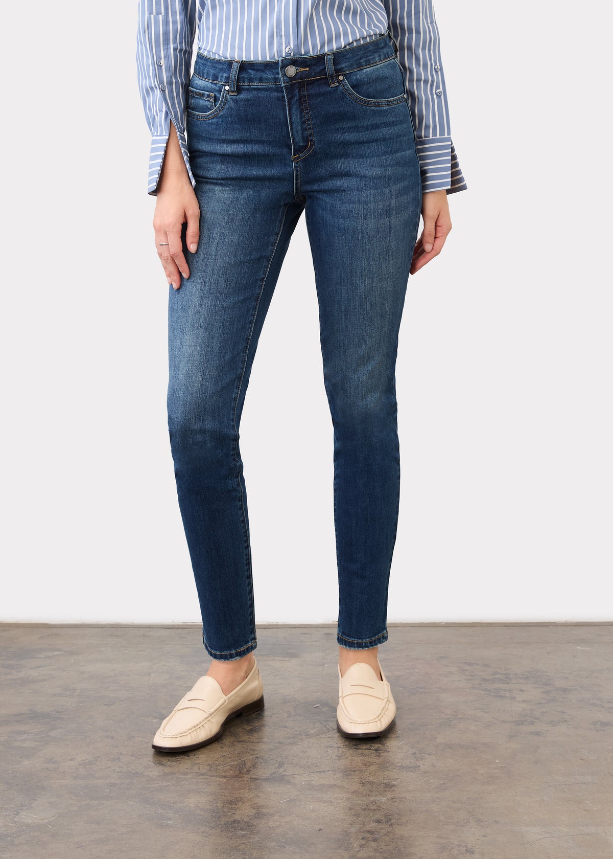 Front view of Olivia slim ankle denim in dark wash showing mid-rise waist and front pockets by French Dressing Jeans (FDJ)