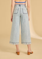 Back view of ocean denim wide crop jeans highlighting patch pockets by French Dressing Jeans (FDJ)