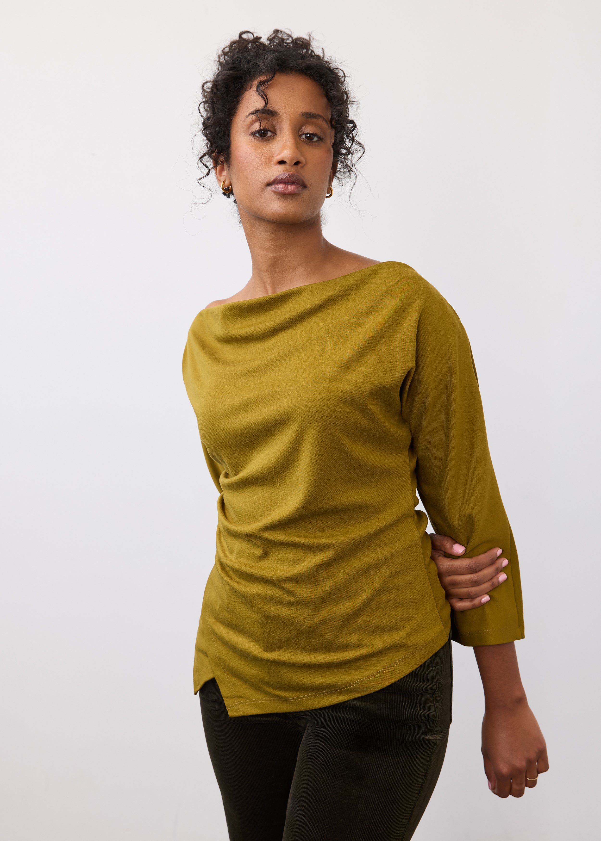 Front view of olive green top with asymmetrical hem and quarter sleeves by French Dressing Jeans (FDJ)