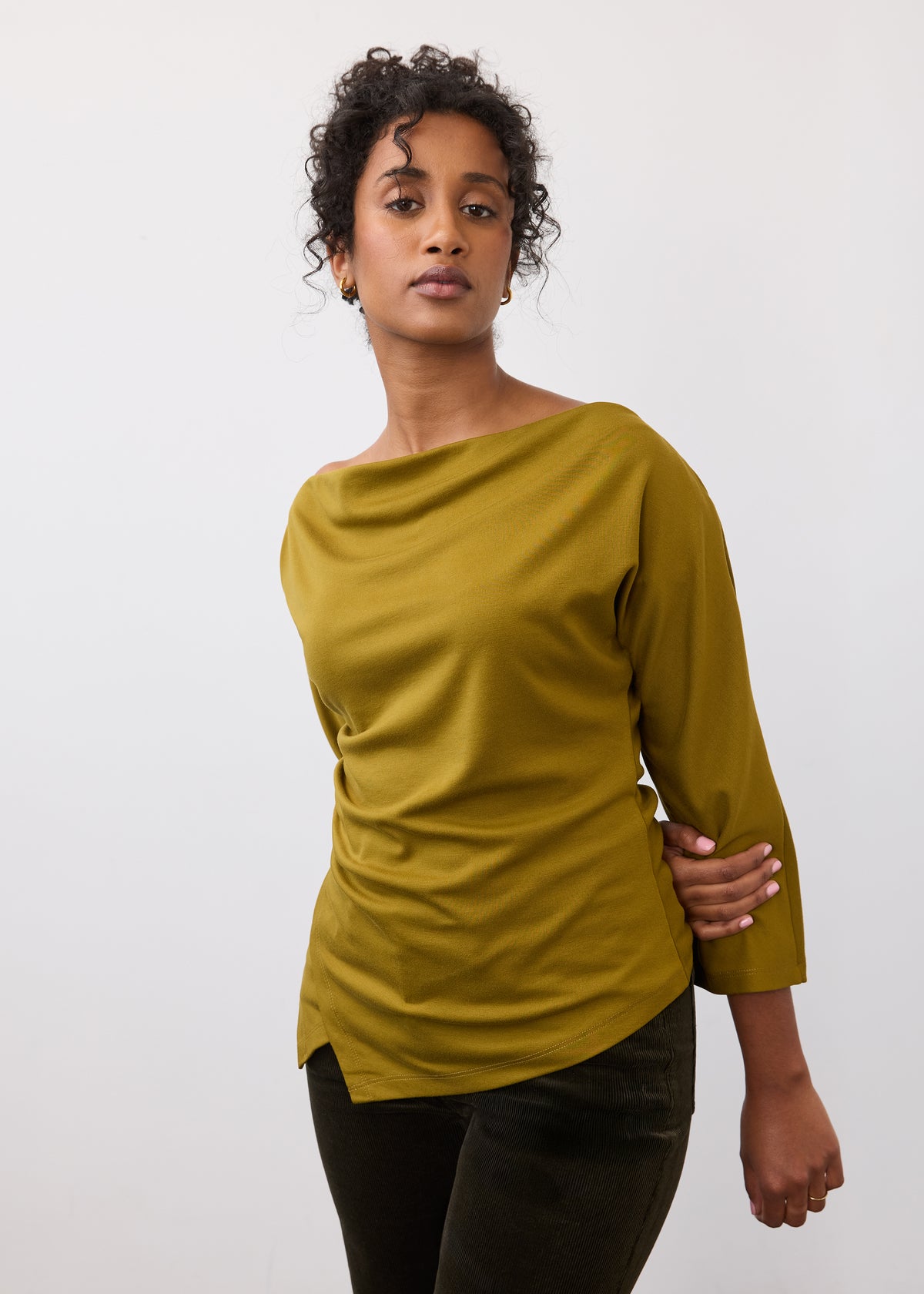 Front view of olive green top with asymmetrical hem and quarter sleeves by French Dressing Jeans (FDJ)