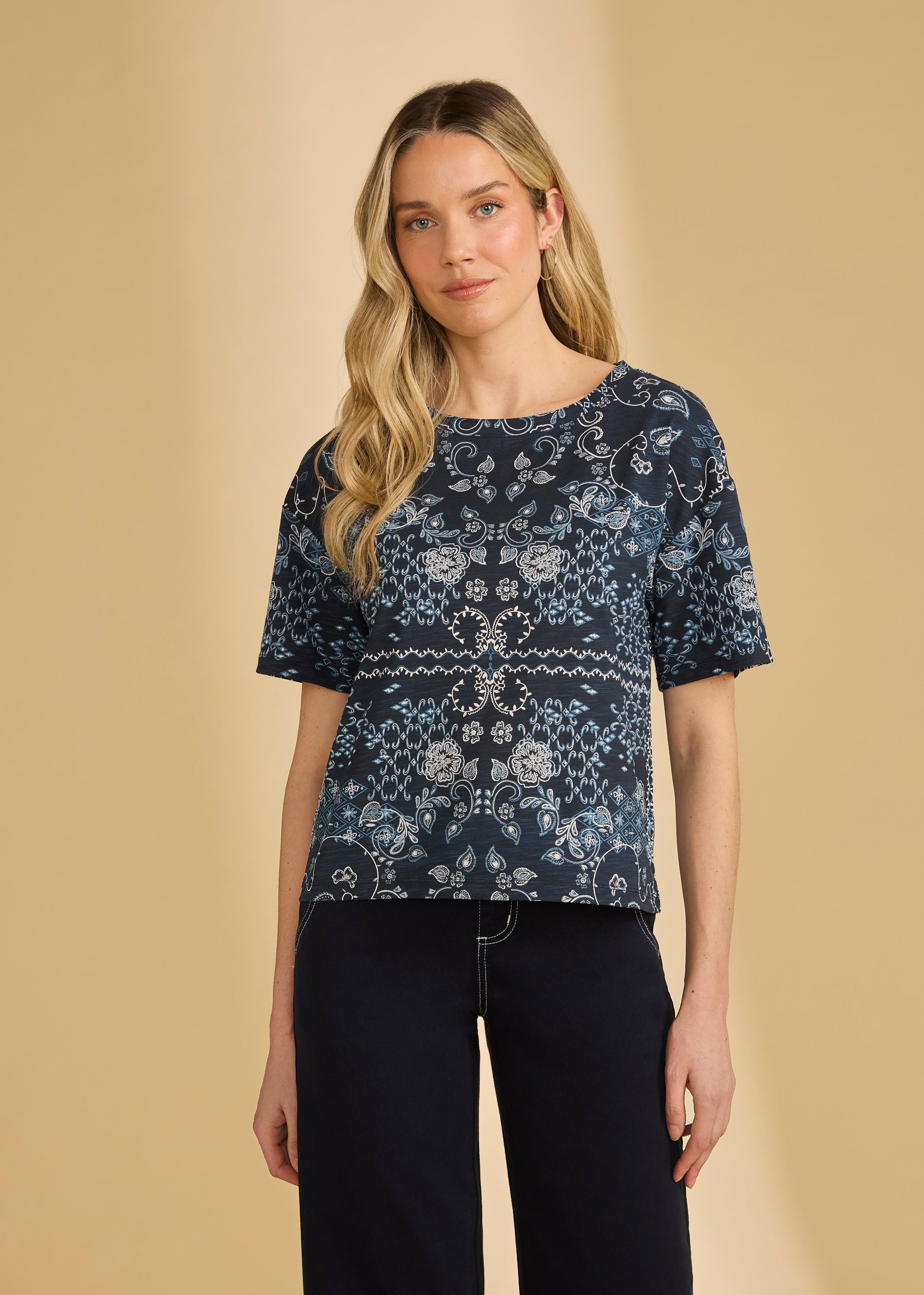 Front view of blue Polynesian block print top showing short sleeves and round neckline by French Dressing Jeans (FDJ)