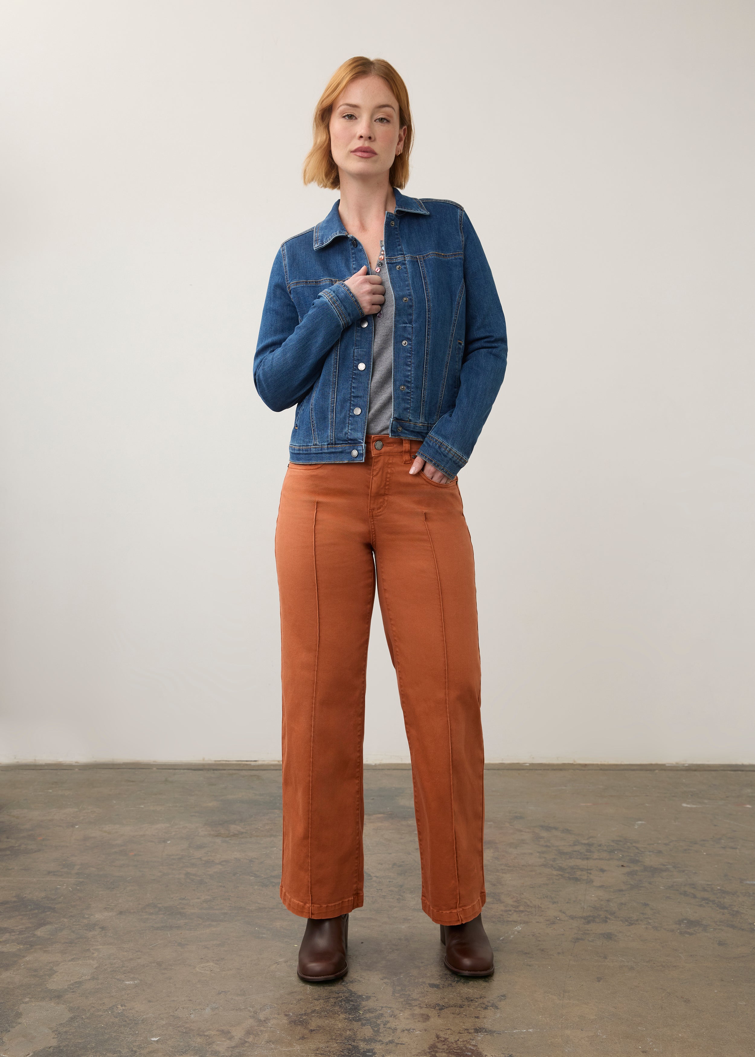 Full view of denim jacket paired with orange pants, showing casual style by French Dressing Jeans (FDJ)
