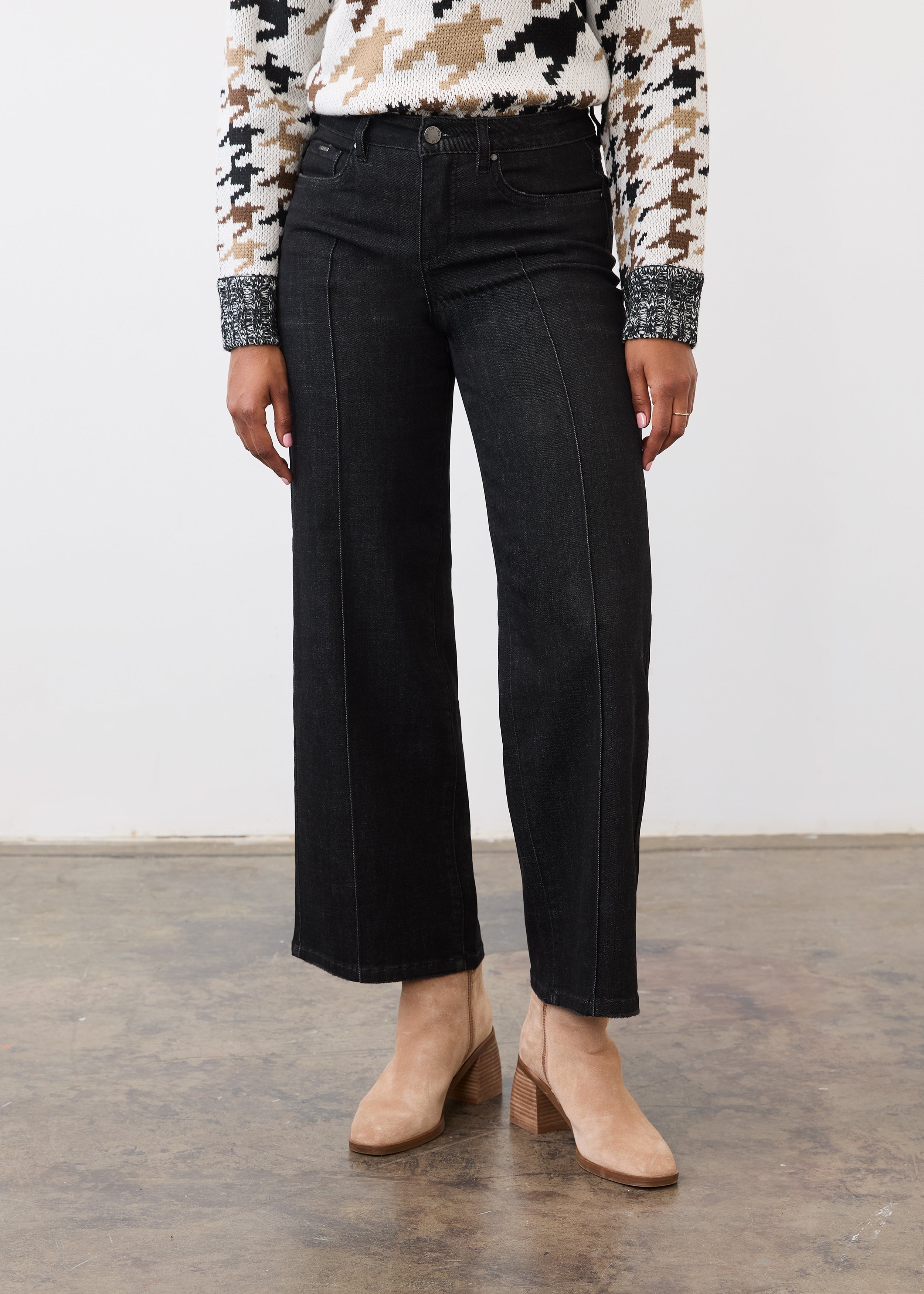 Front view of black wide-leg denim showing pintuck seams and mid-rise waist by French Dressing Jeans (FDJ)
