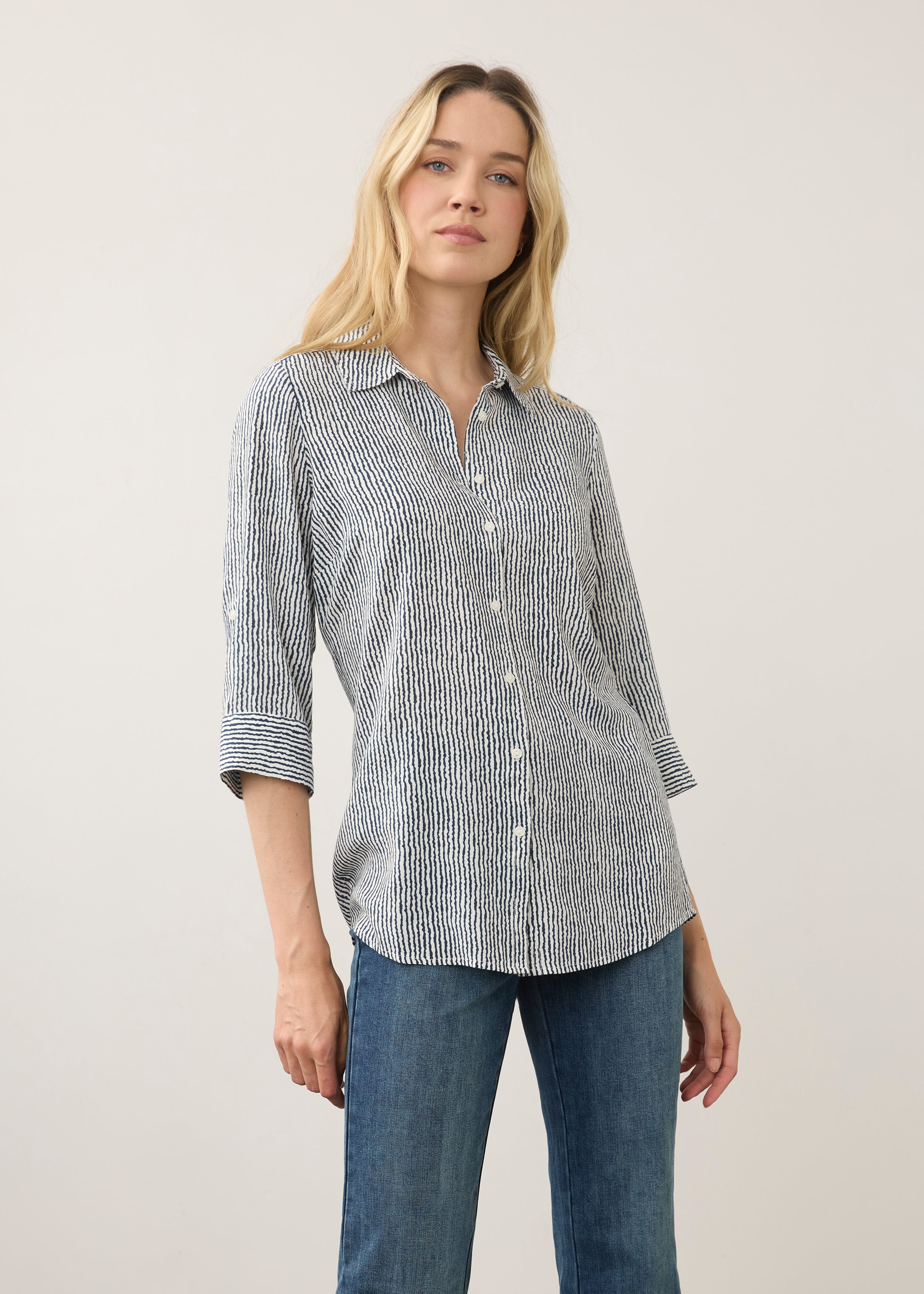 Front view of striped navy and white shirt with button front by French Dressing Jeans (FDJ)