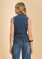 Back view of dark wash sleeveless denim top with tie detail and seam lines by French Dressing Jeans (FDJ)
