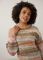Detail shot of natural spacedye boucle sweater focusing on boat neckline by French Dressing Jeans (FDJ)