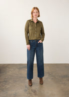 Model in olive suede shirt and jeans, full body view by French Dressing Jeans (FDJ)