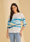 Front view of white top with blue wave patterns and 3/4 sleeves by French Dressing Jeans (FDJ)