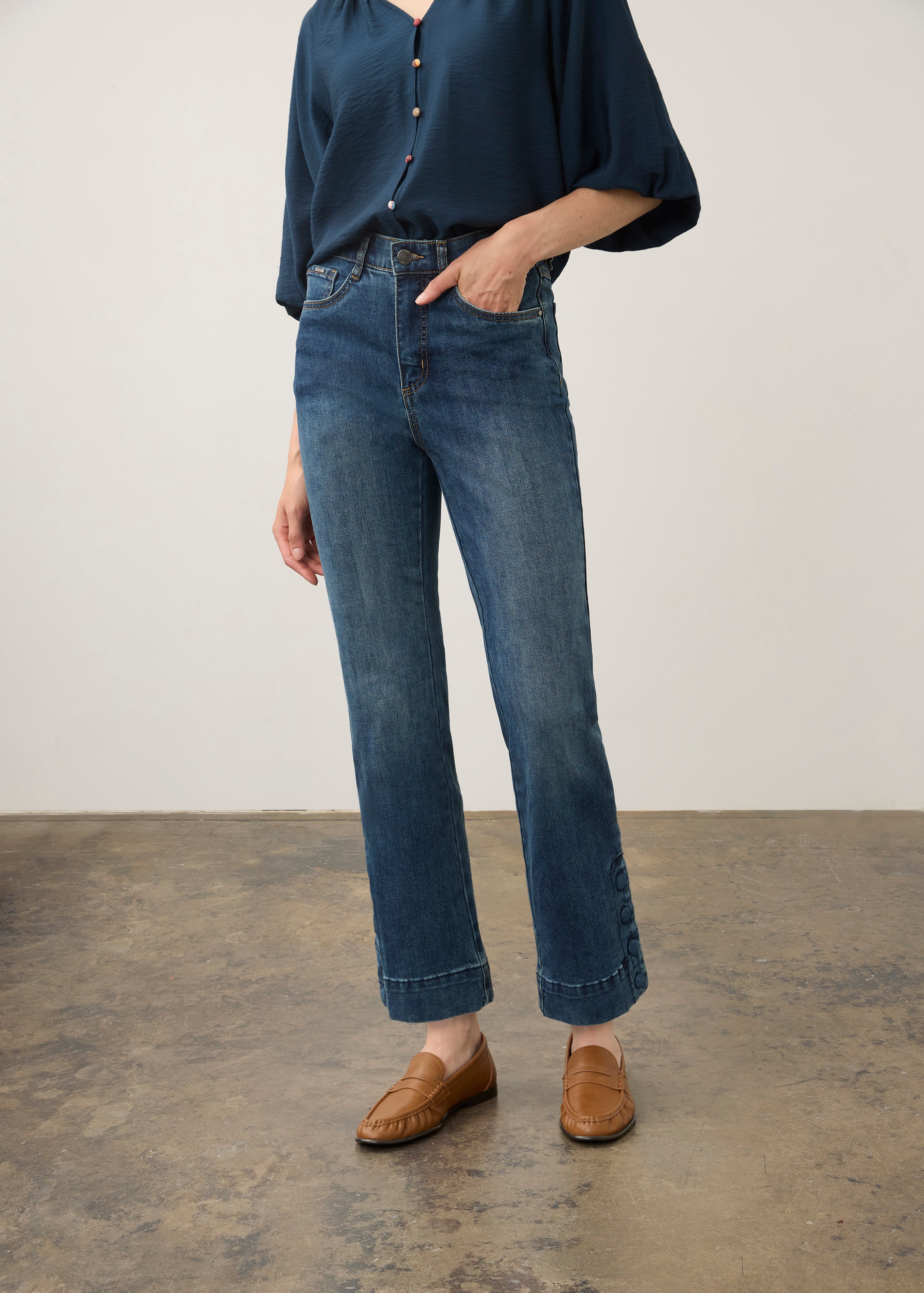 Front view of medium blue Olivia denim with a mid-rise waist and buttoned cuffs by French Dressing Jeans (FDJ)