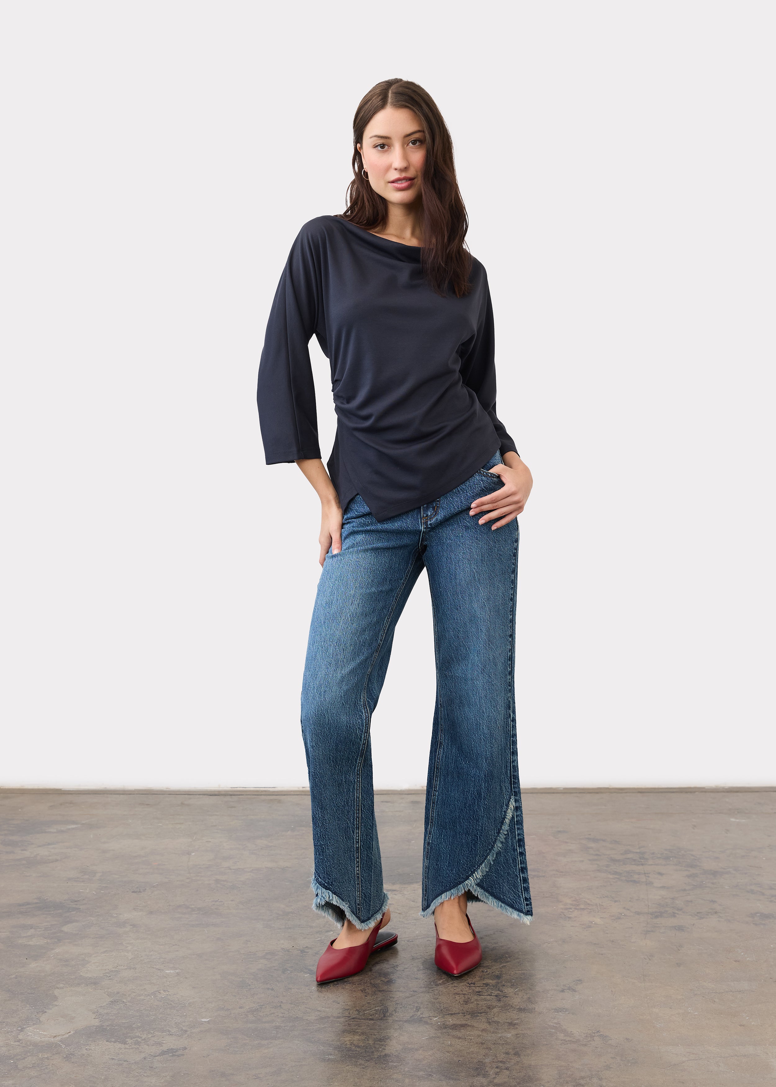 Full view of navy top paired with denim jeans and red shoes by French Dressing Jeans (FDJ)
