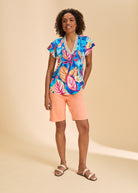 Front view of Petite Suzanne shorts in peach, showcasing vibrant color by French Dressing Jeans (FDJ)