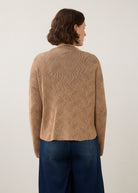Back view of tan textured top showing seamless design by French Dressing Jeans (FDJ)