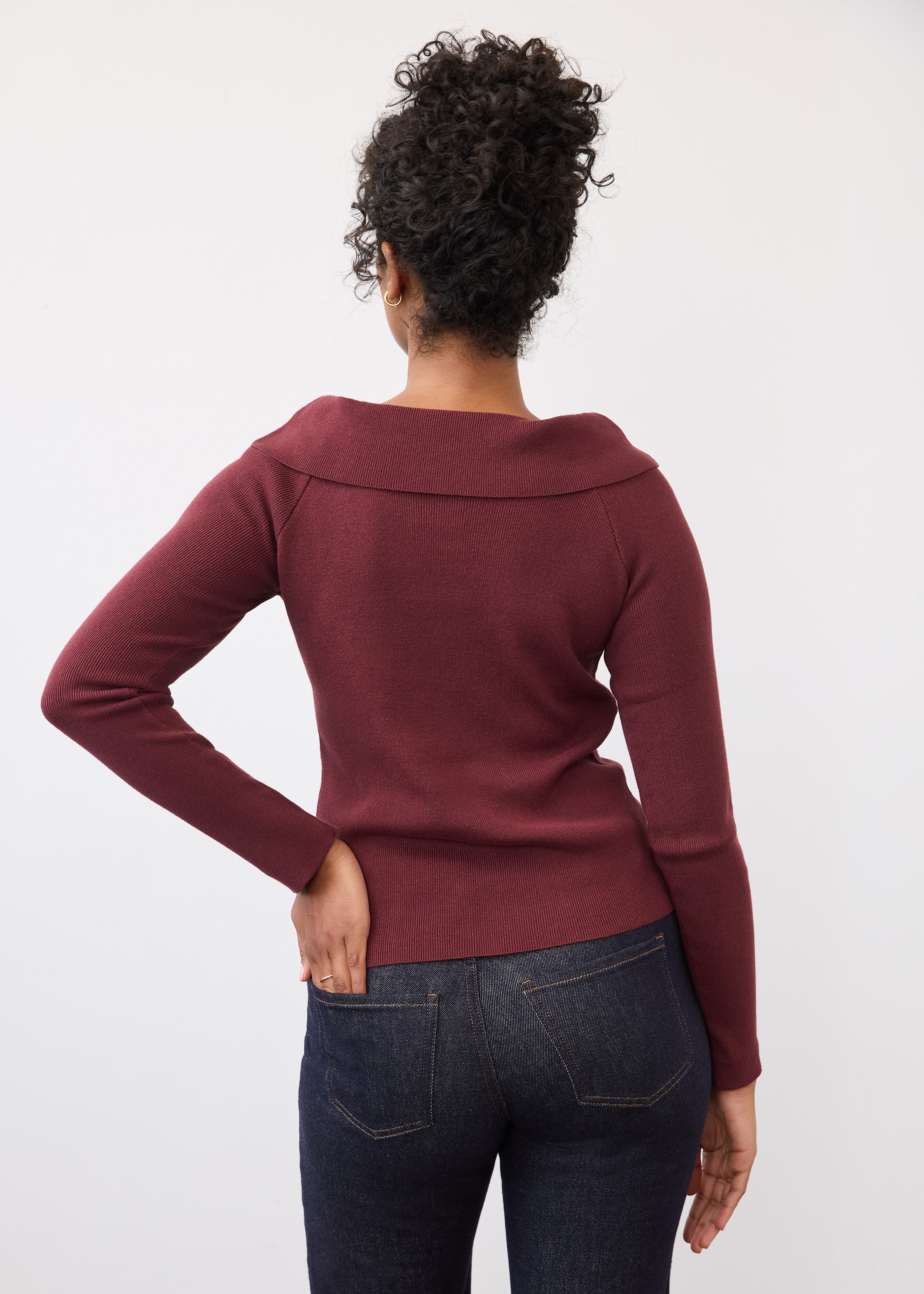 Back view of burgundy off-the-shoulder sweater showing fit by French Dressing Jeans (FDJ)