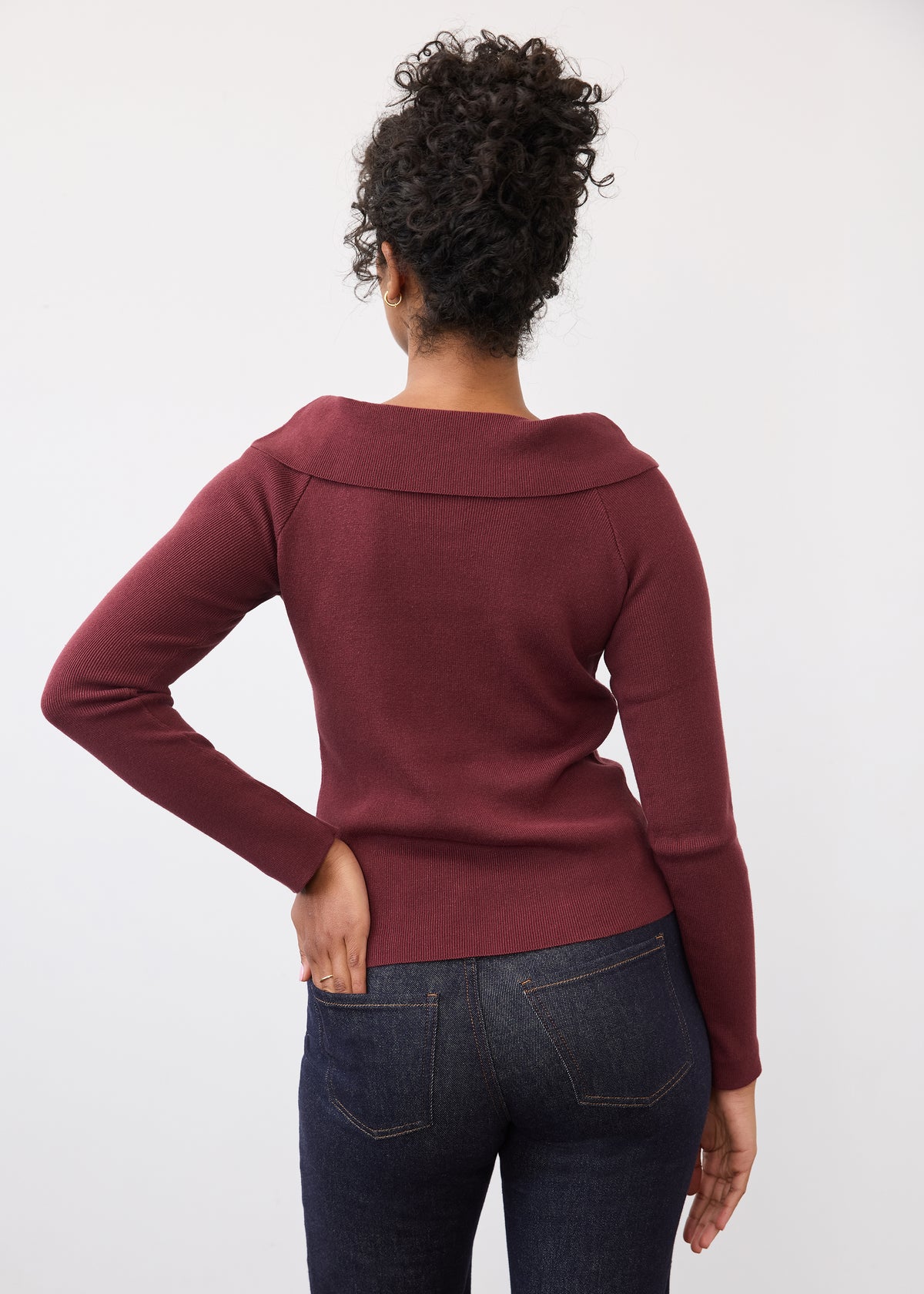 Back view of burgundy off-the-shoulder sweater showing fit by French Dressing Jeans (FDJ)