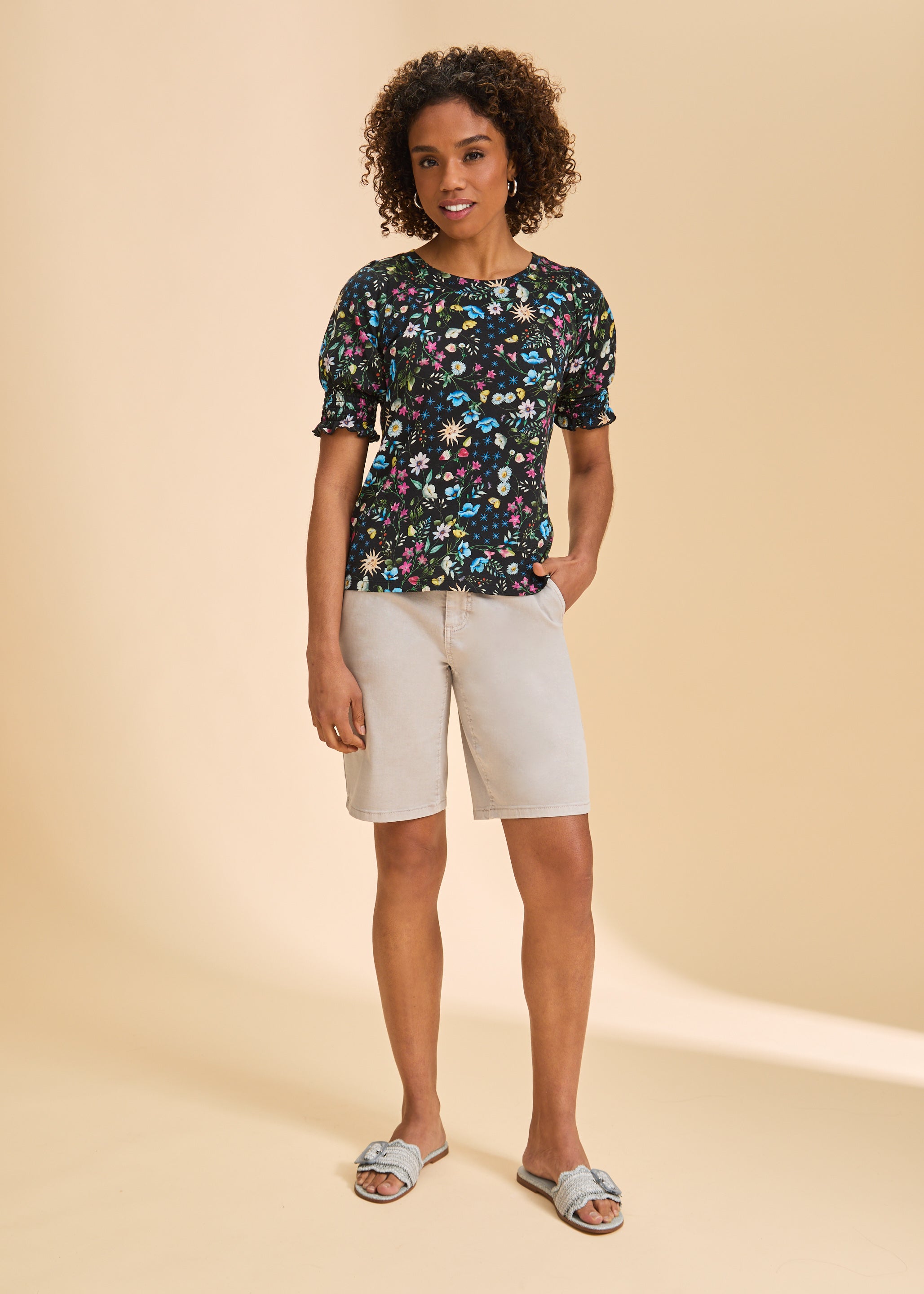 Front view of Petite Suzanne shorts in taupe, paired with floral top by French Dressing Jeans (FDJ)