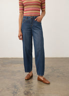 Front view of dark wash jeans with colorful knit top, showing front pockets by French Dressing Jeans (FDJ) par French Dressing Jeans (FDJ)