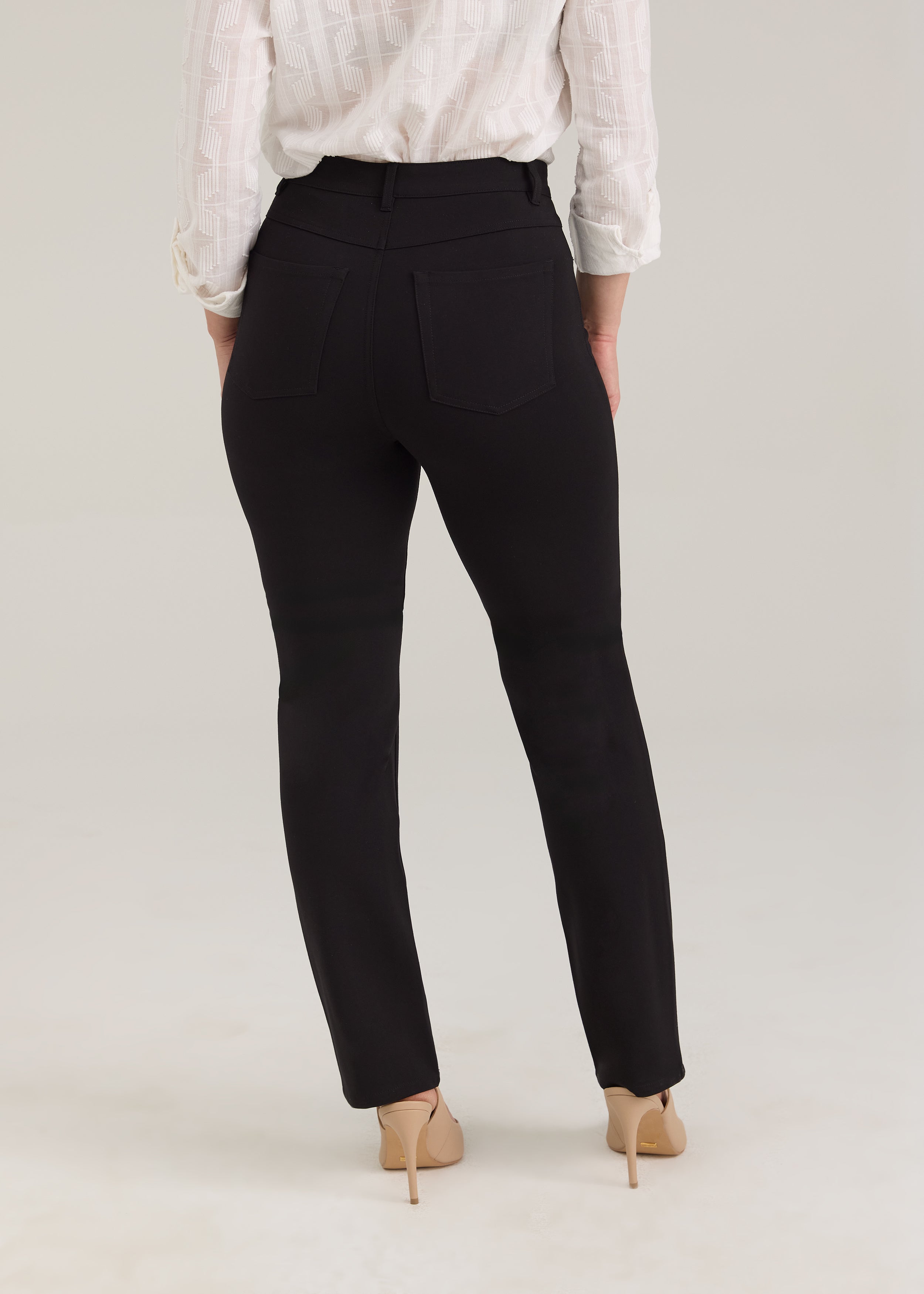 Back view of black pants featuring patch pockets by French Dressing Jeans (FDJ)