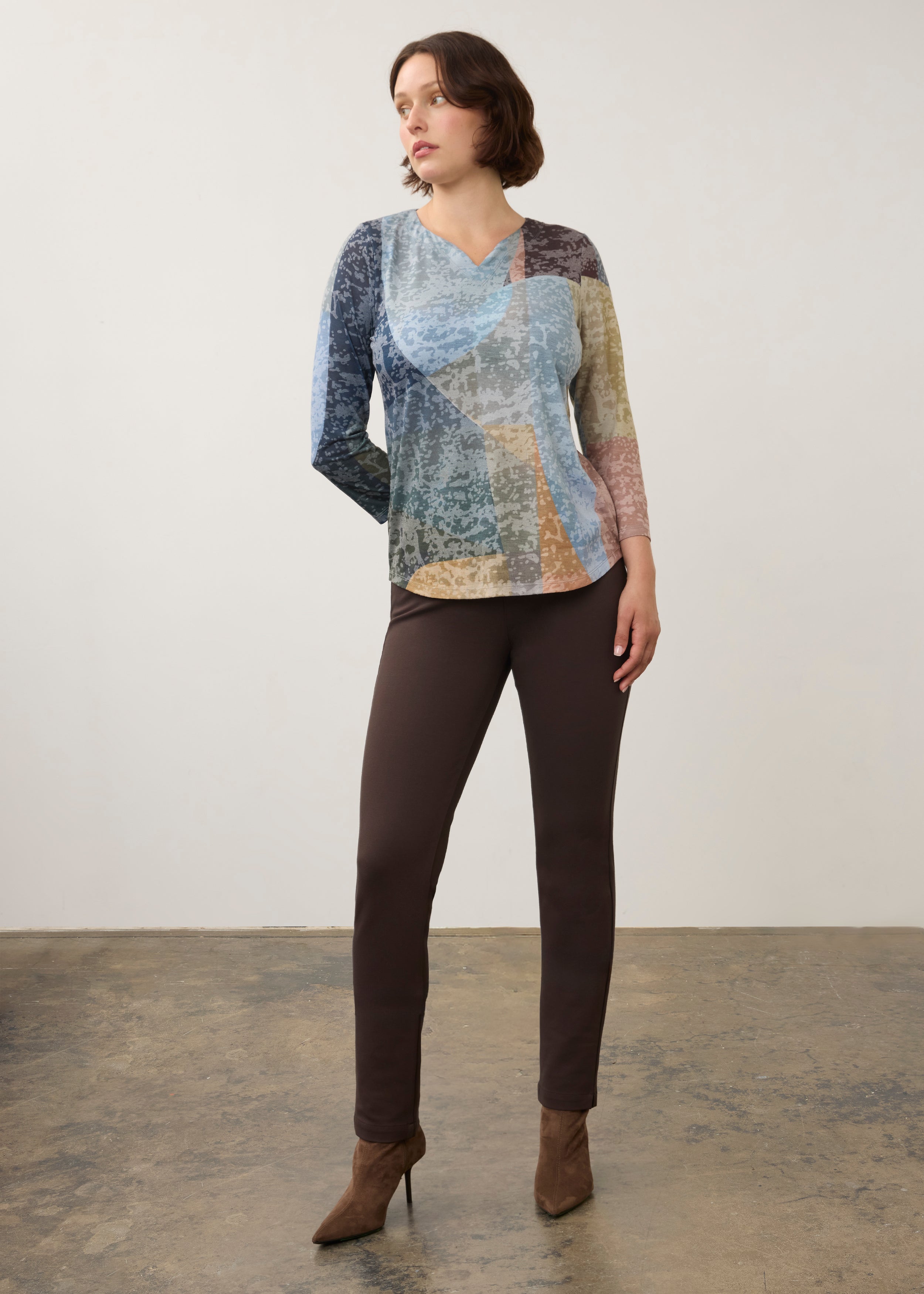 Full-body view of 3/4 sleeve notch neck top paired with brown pants in Warn color by French Dressing Jeans (FDJ)