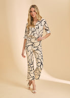 Front view of beige plumeria boot crop pants with a flattering fit by French Dressing Jeans (FDJ)