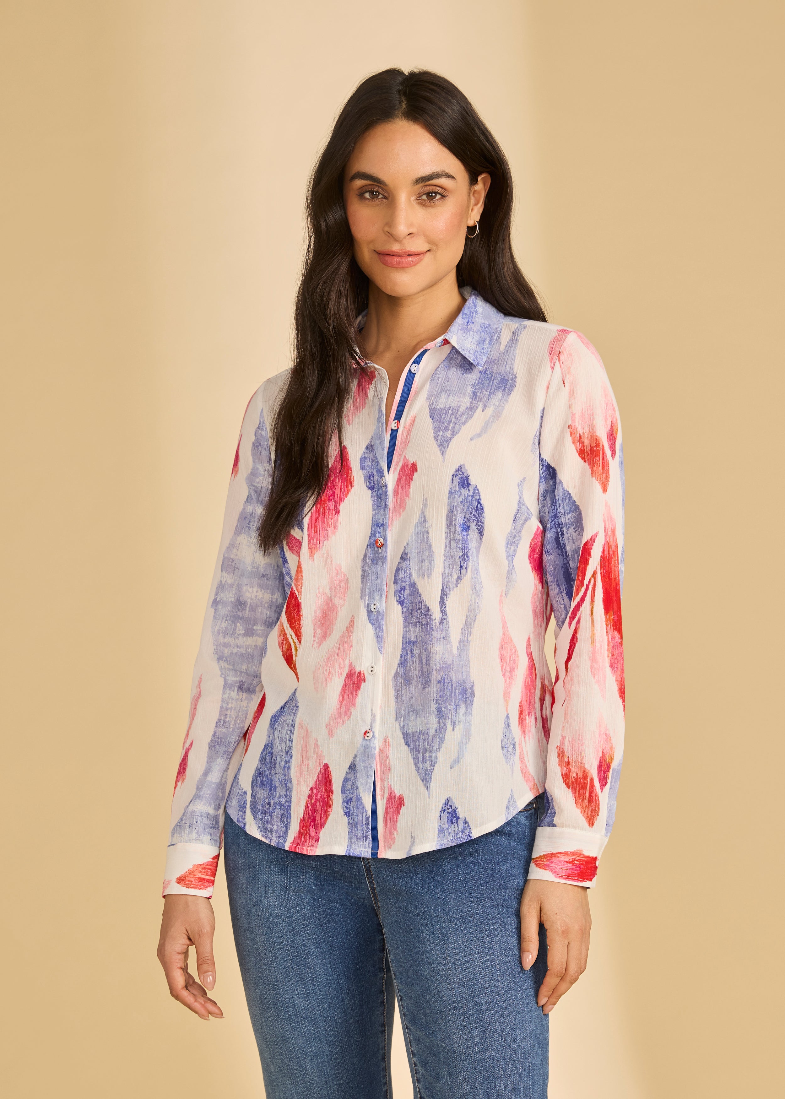 Front view of colorful long sleeve button-up blouse with vibrant pattern, by French Dressing Jeans (FDJ)