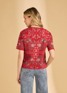 Back view of red Polynesian block print top showcasing intricate design and comfortable cut by French Dressing Jeans (FDJ)