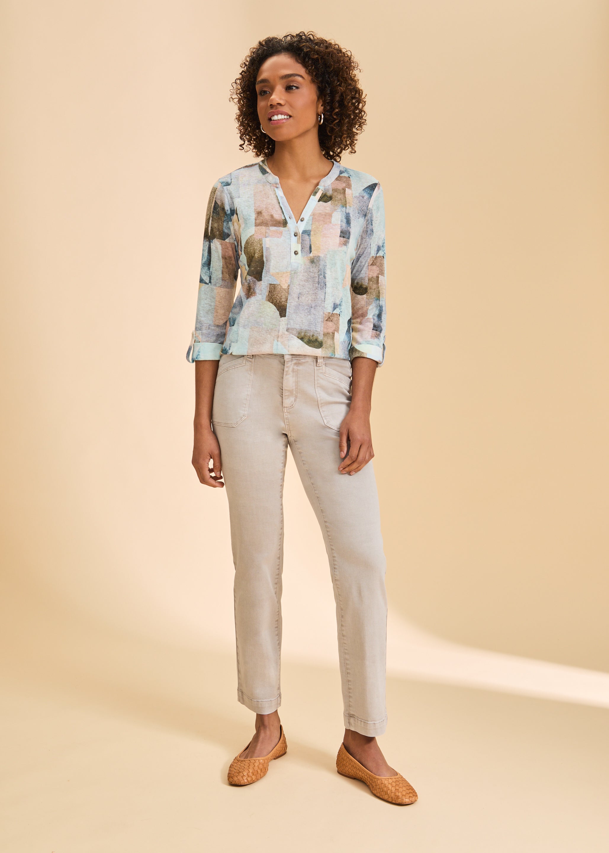 Full body view of 3/4 sleeve Henley top paired with beige pants, highlighting relaxed fit by French Dressing Jeans (FDJ)