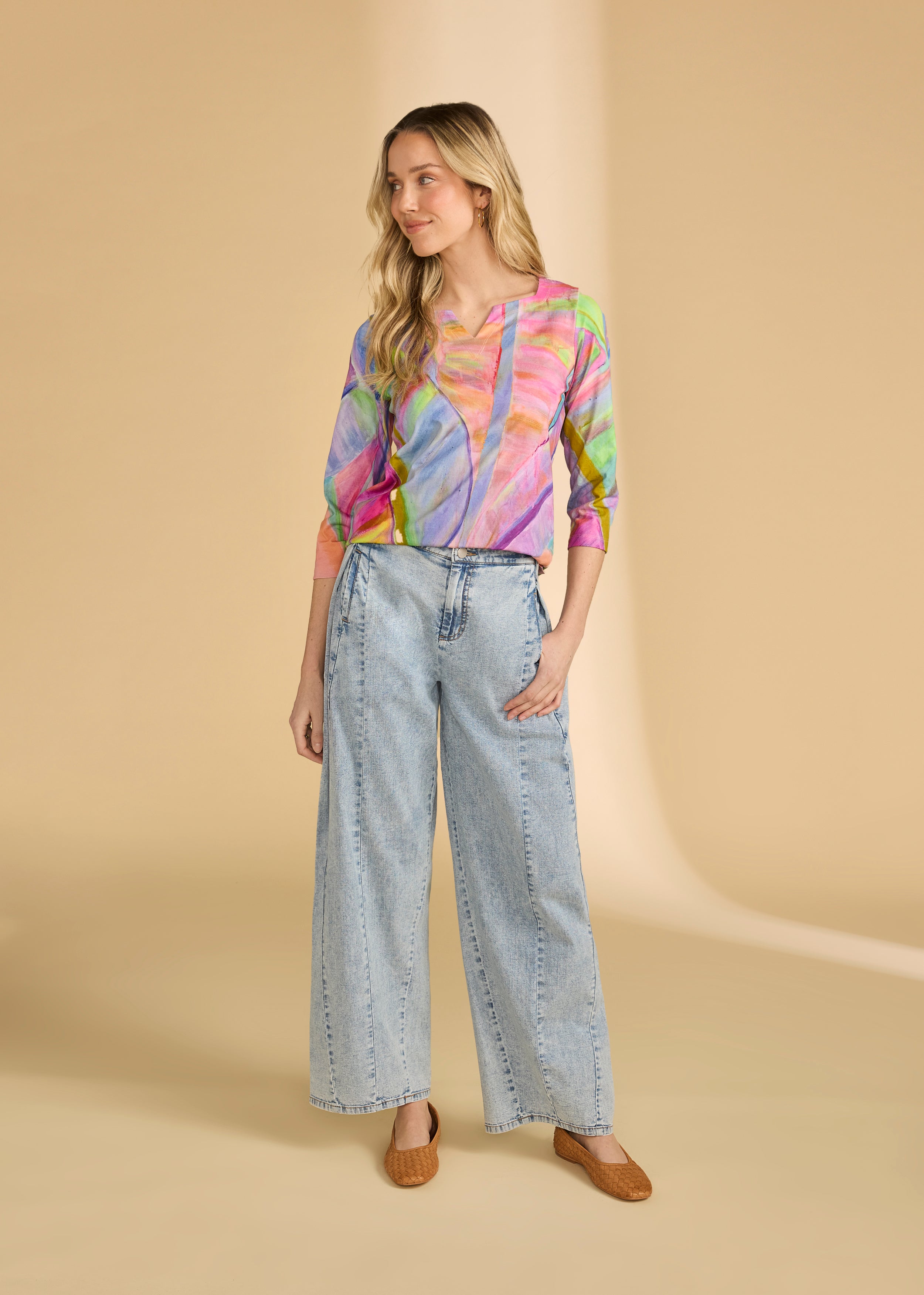 Full body view of neon palm top paired with wide-leg jeans, showcasing casual style by French Dressing Jeans (FDJ)
