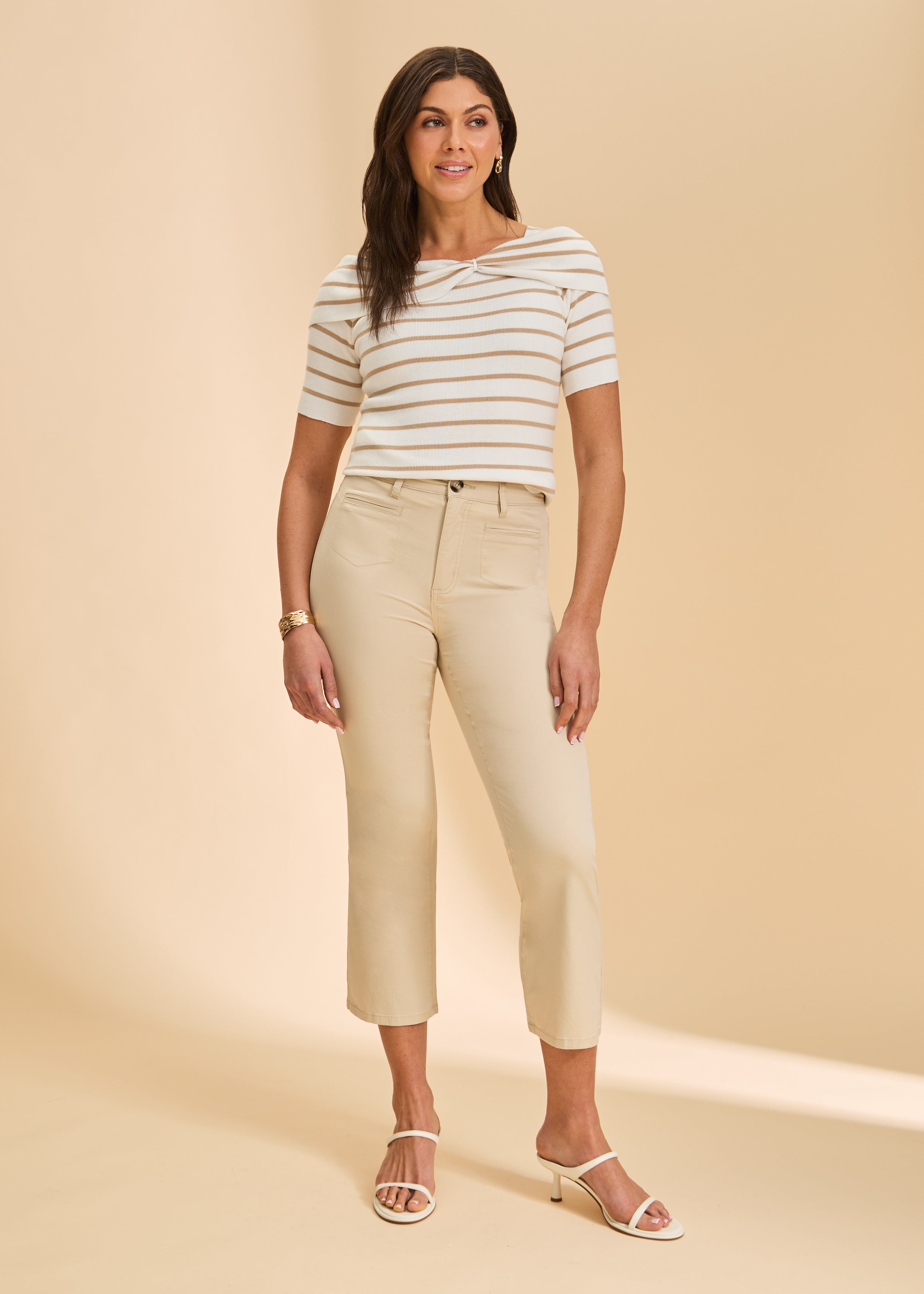 Full view of beige and white stripe sweater paired with light beige pants by French Dressing Jeans (FDJ)