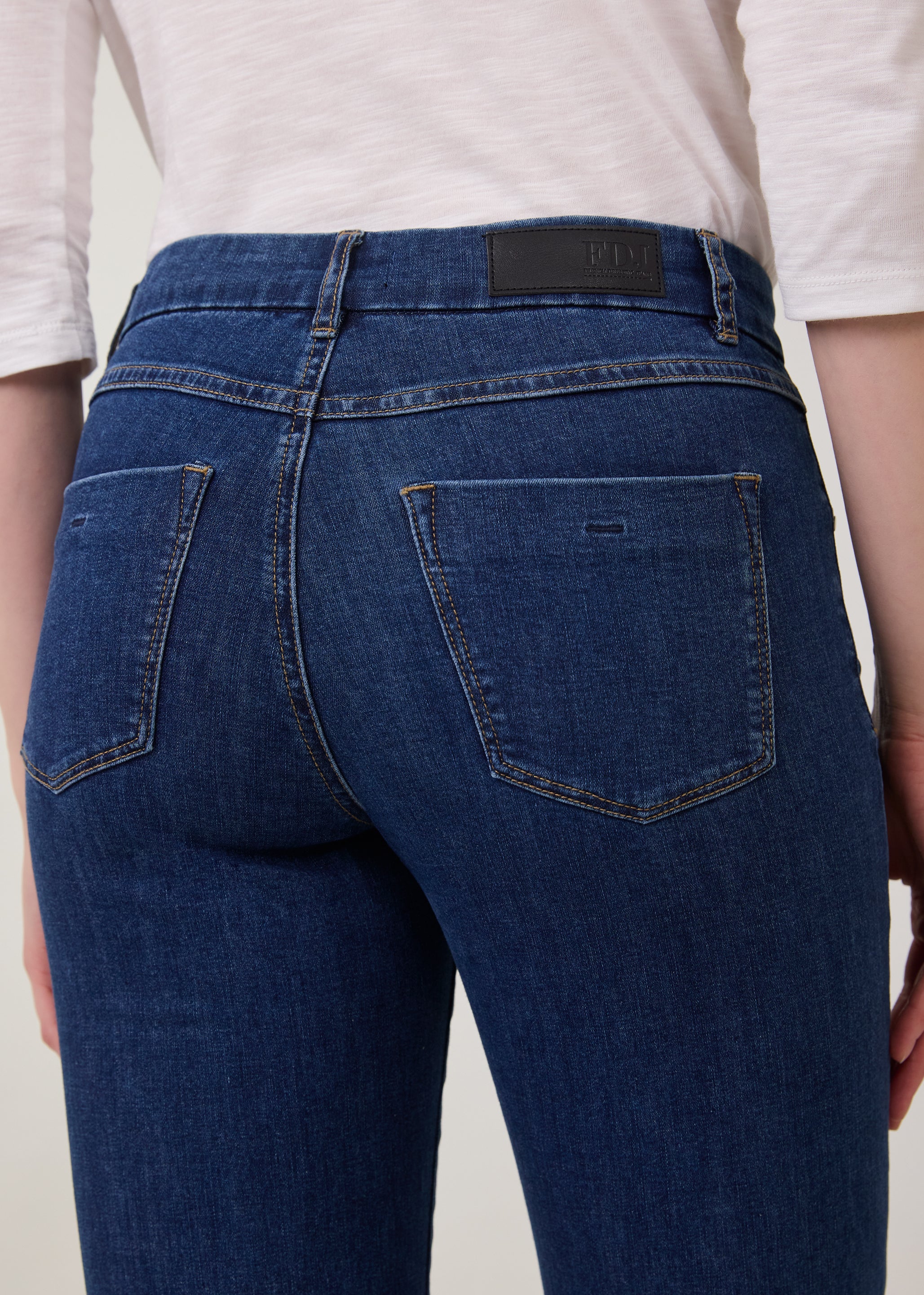 Close-up of back pocket stitching on Delight straight leg jeans by French Dressing Jeans (FDJ)