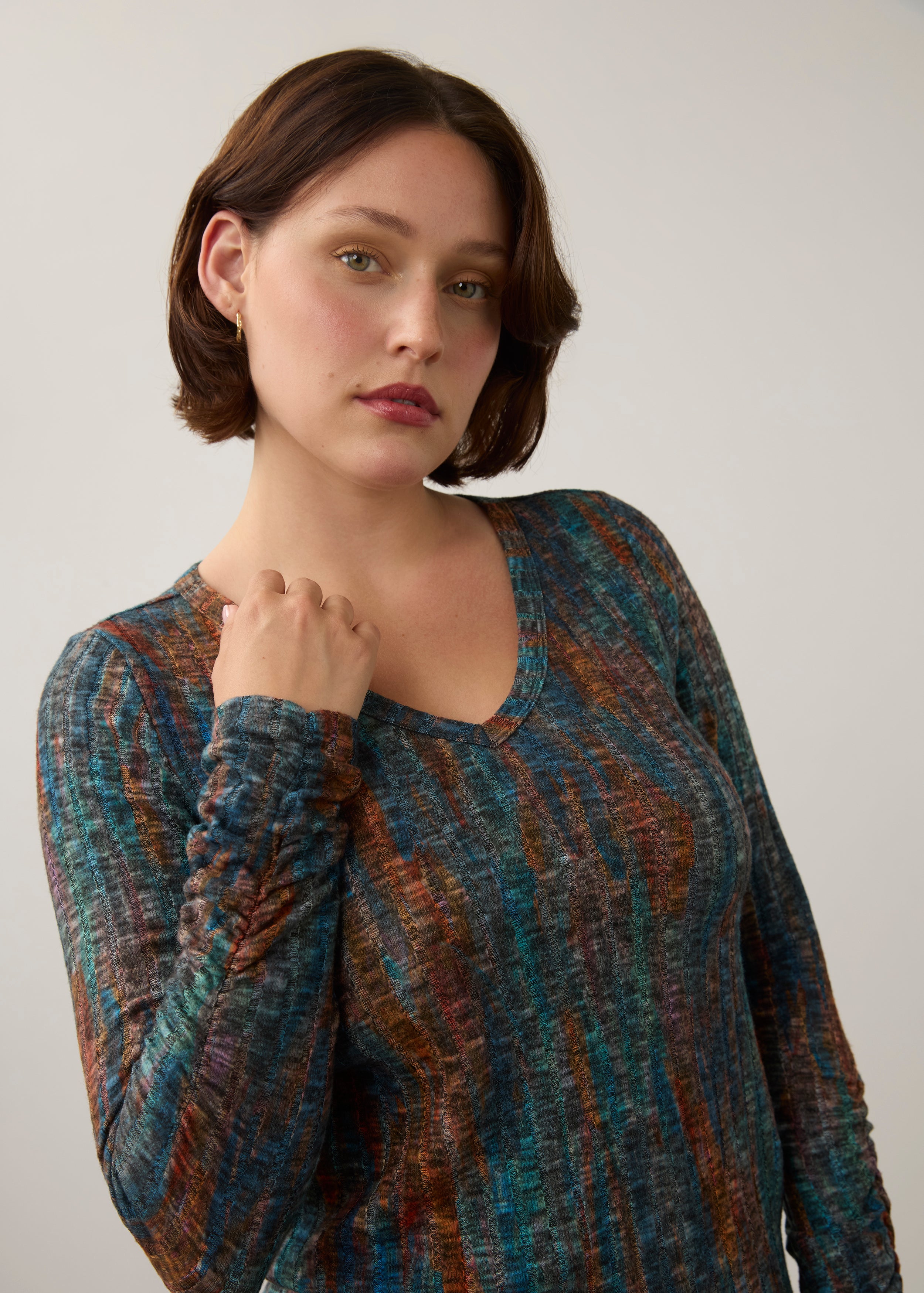 Close-up of striped V-neck top, showcasing detailed pattern and neckline by French Dressing Jeans (FDJ)