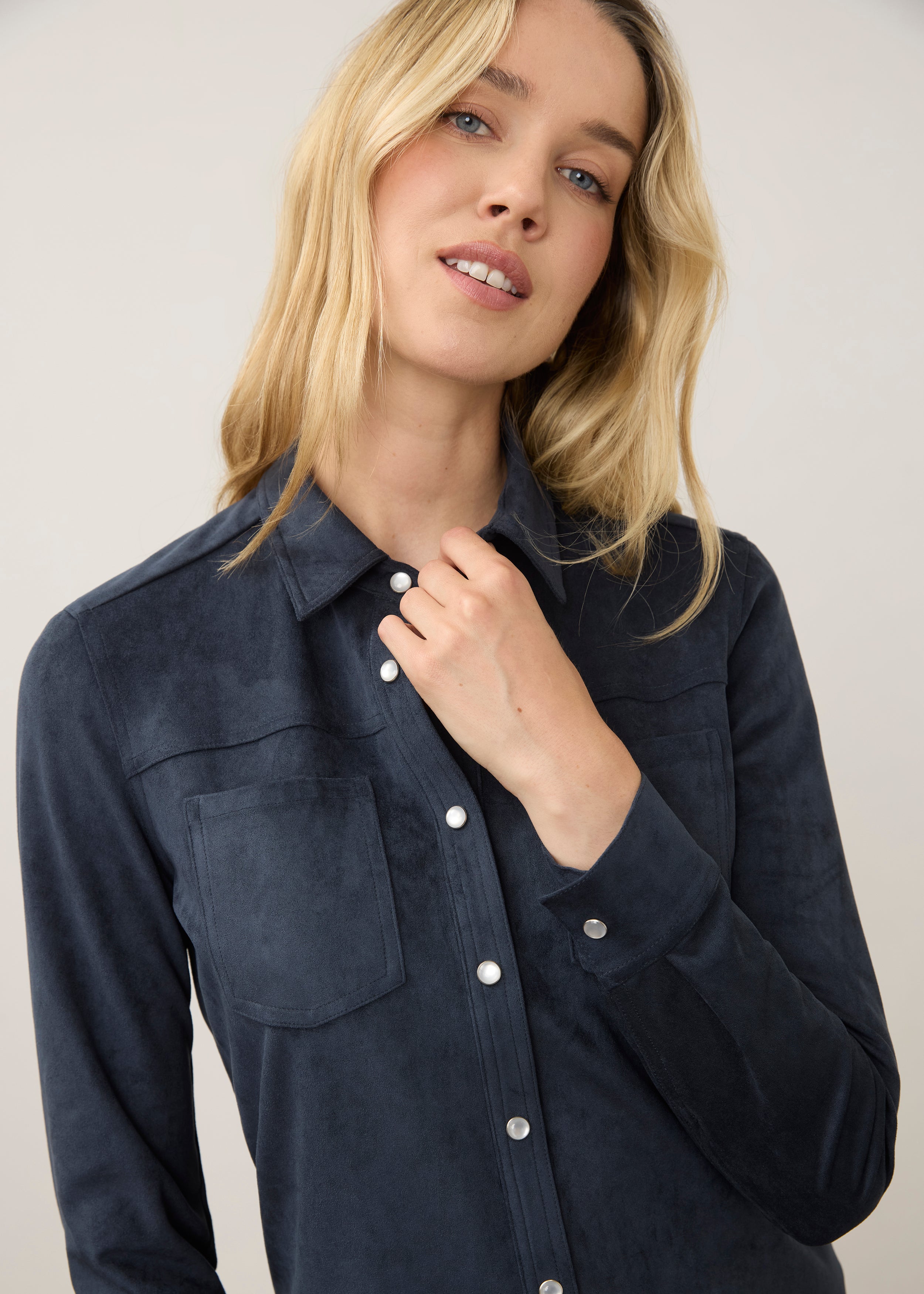 Close-up of navy suede shirt highlighting button details by French Dressing Jeans (FDJ)