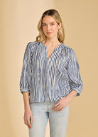 Front view of navy striped blouse featuring V-neck and relaxed fit by French Dressing Jeans (FDJ)