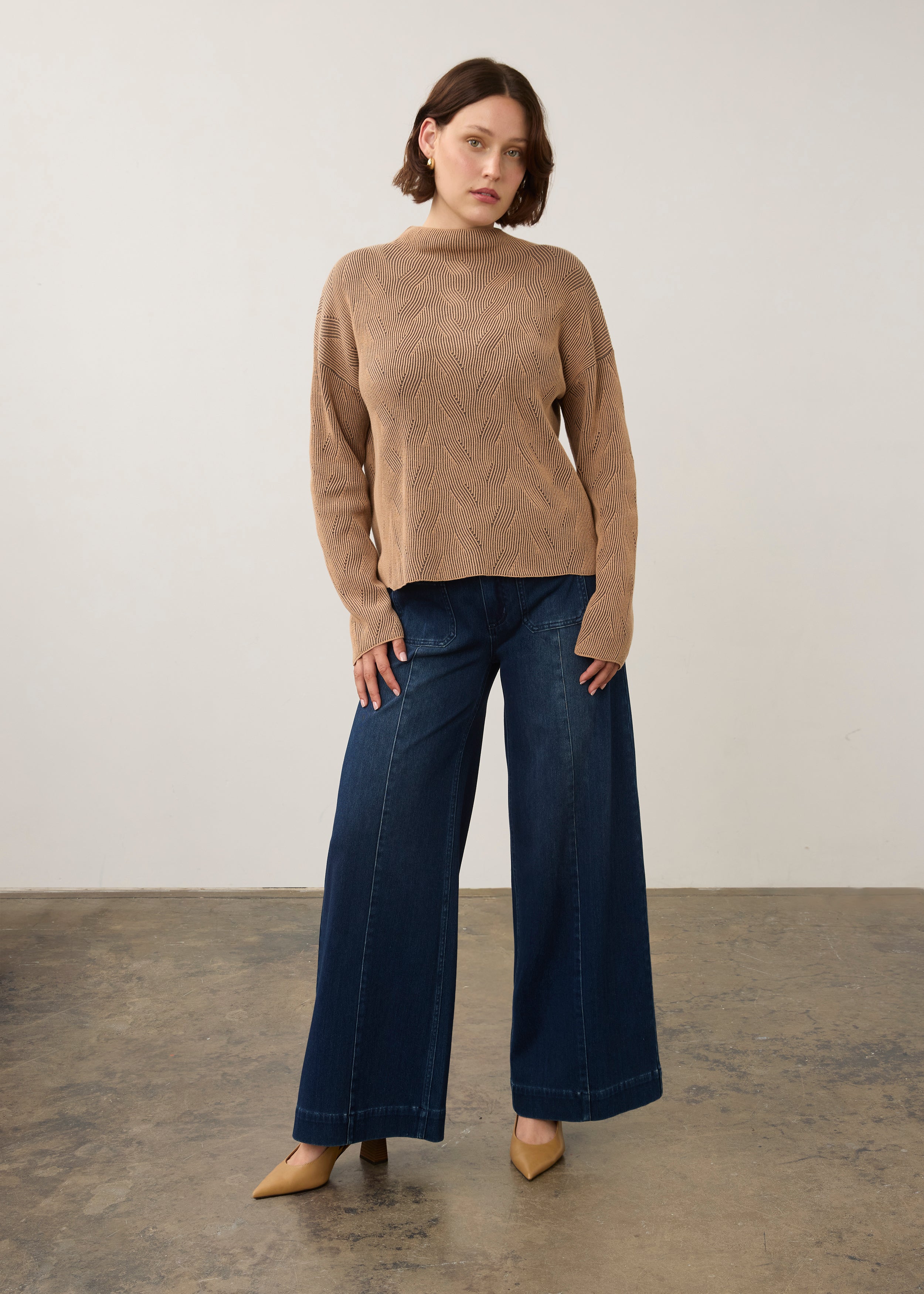 Model in tan textured top paired with wide-leg pants, full outfit view by French Dressing Jeans (FDJ)