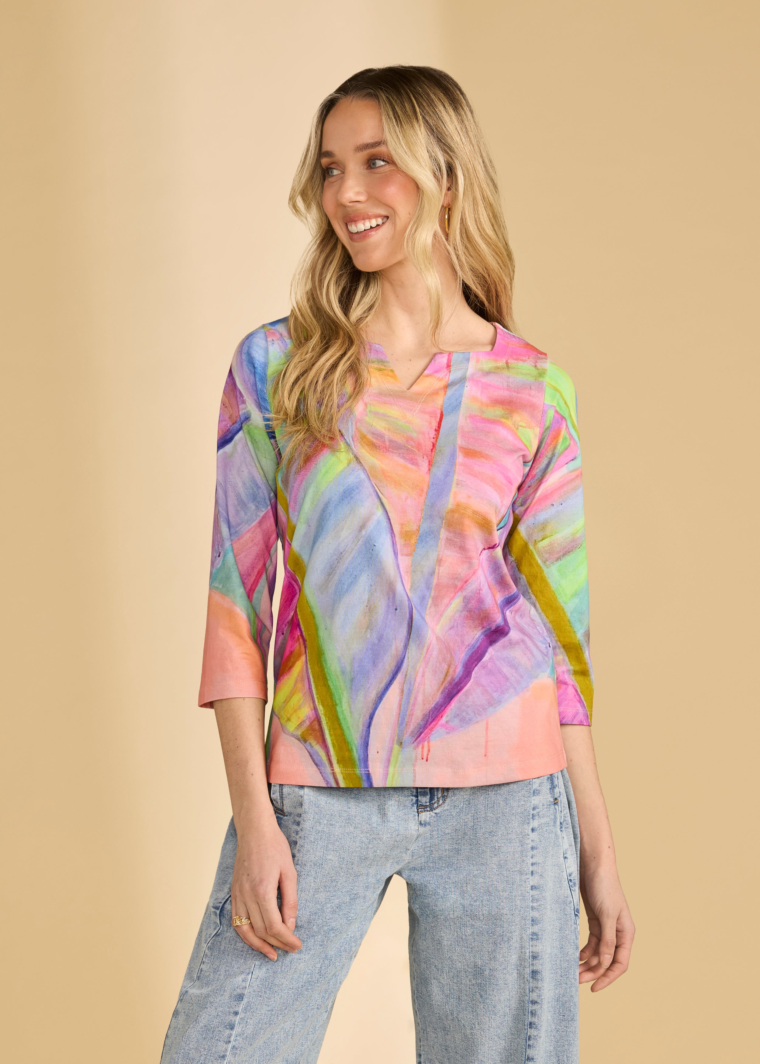 Front view of 3/4 sleeve notch neck top in neon palm with colorful abstract pattern by French Dressing Jeans (FDJ)