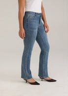 Side view of light wash jeans highlighting the leg shape and style by French Dressing Jeans (FDJ)