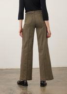 Back view of olive wide-leg denim showcasing patch pockets by French Dressing Jeans (FDJ) par French Dressing Jeans (FDJ)