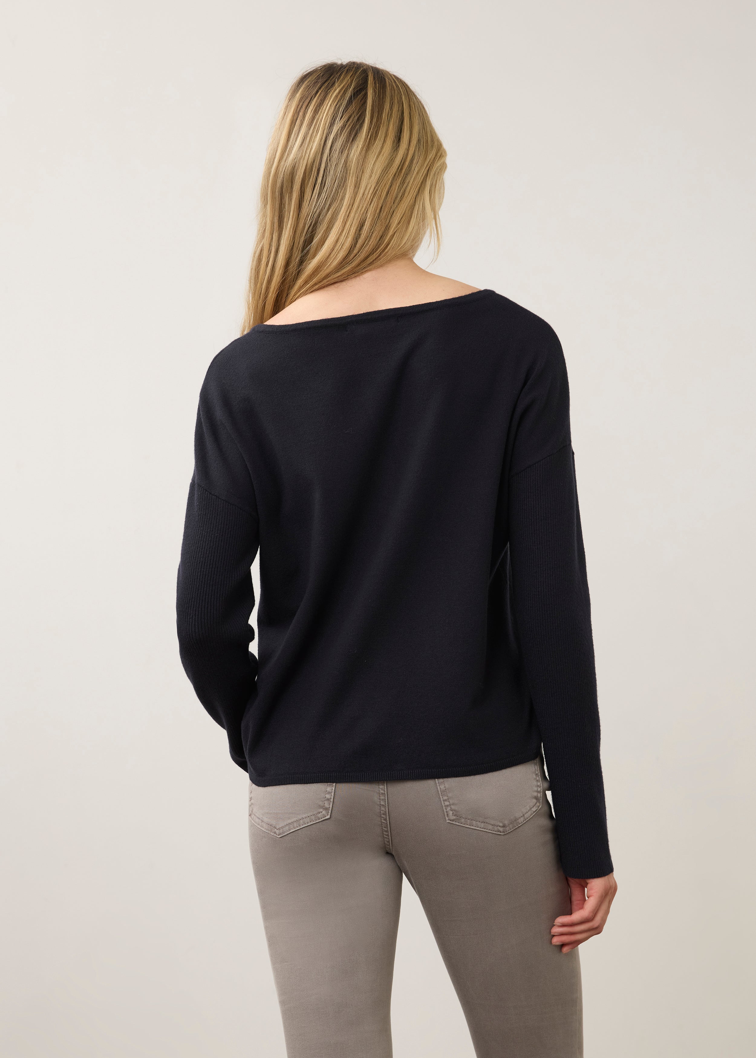 Back view of navy sweater showing simple, sleek design by French Dressing Jeans (FDJ)