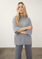 Front view of grey tunic sweater highlighting ribbed hem and sleeves by French Dressing Jeans (FDJ)