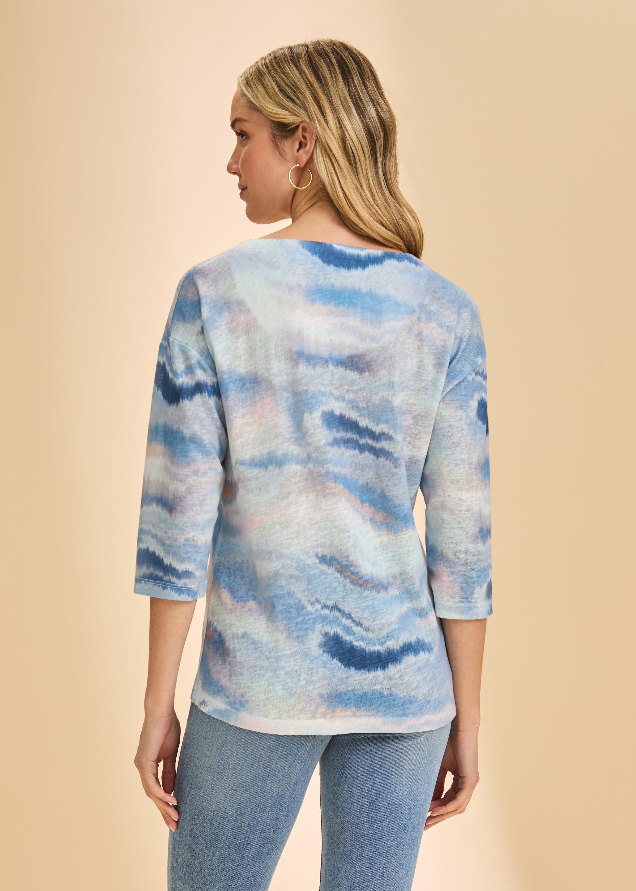 Back view of blue wave pattern on 3/4 sleeve V-neck top by French Dressing Jeans (FDJ)