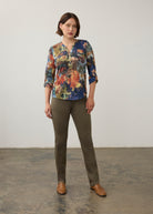 Full body view of multicolor Henley top with olive pants and tan loafers by French Dressing Jeans (FDJ)