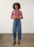 Full view of pink cowl neck top styled with blue jeans by French Dressing Jeans (FDJ)