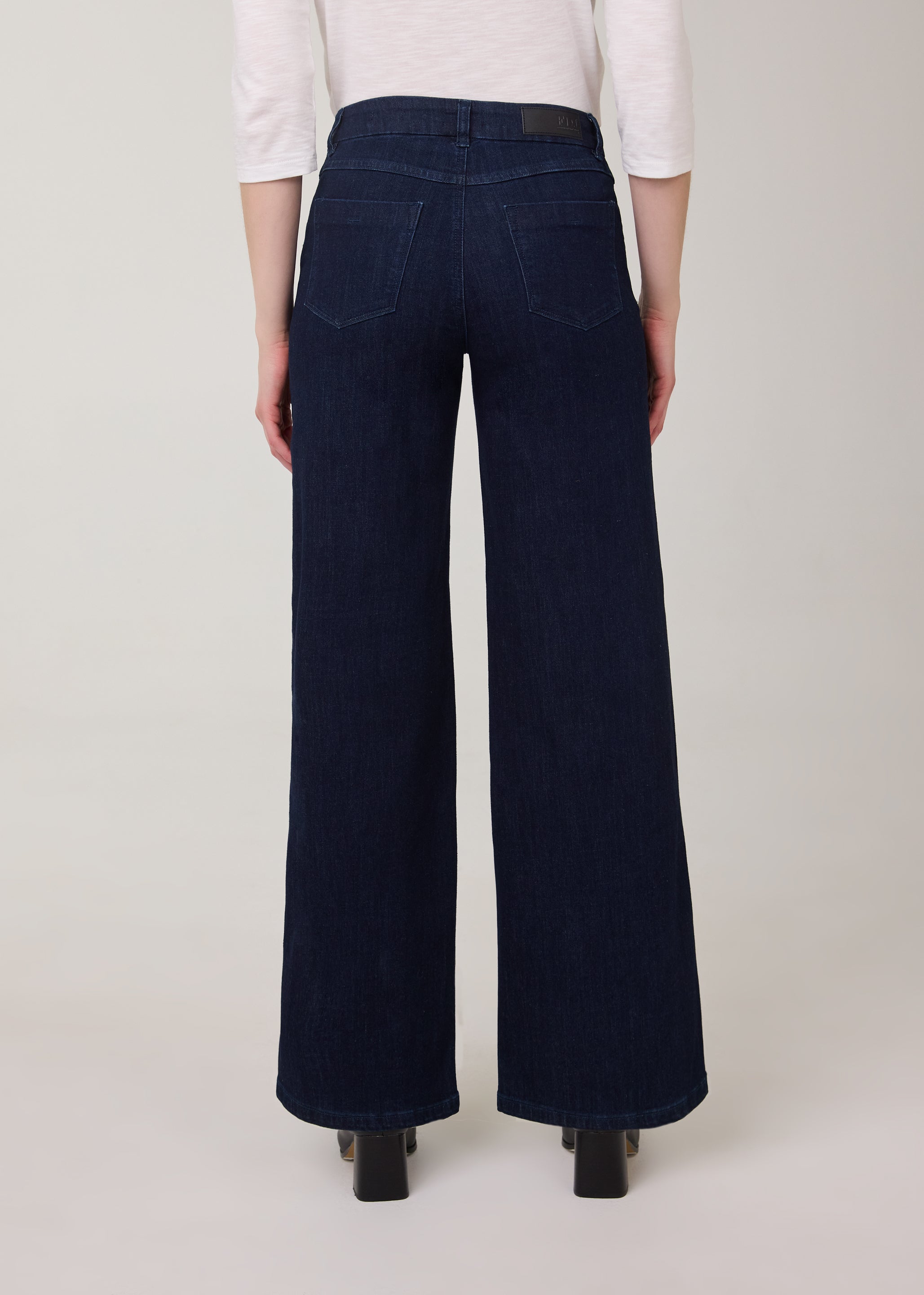 Back view of dark Delight wide-leg jeans highlighting fit by French Dressing Jeans (FDJ)
