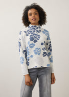 Front view of blue floral sweater with high collar and long sleeves by French Dressing Jeans (FDJ)