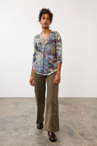 Full-body view of maple wide leg denim paired with floral blouse, showcasing fit and style by French Dressing Jeans (FDJ)