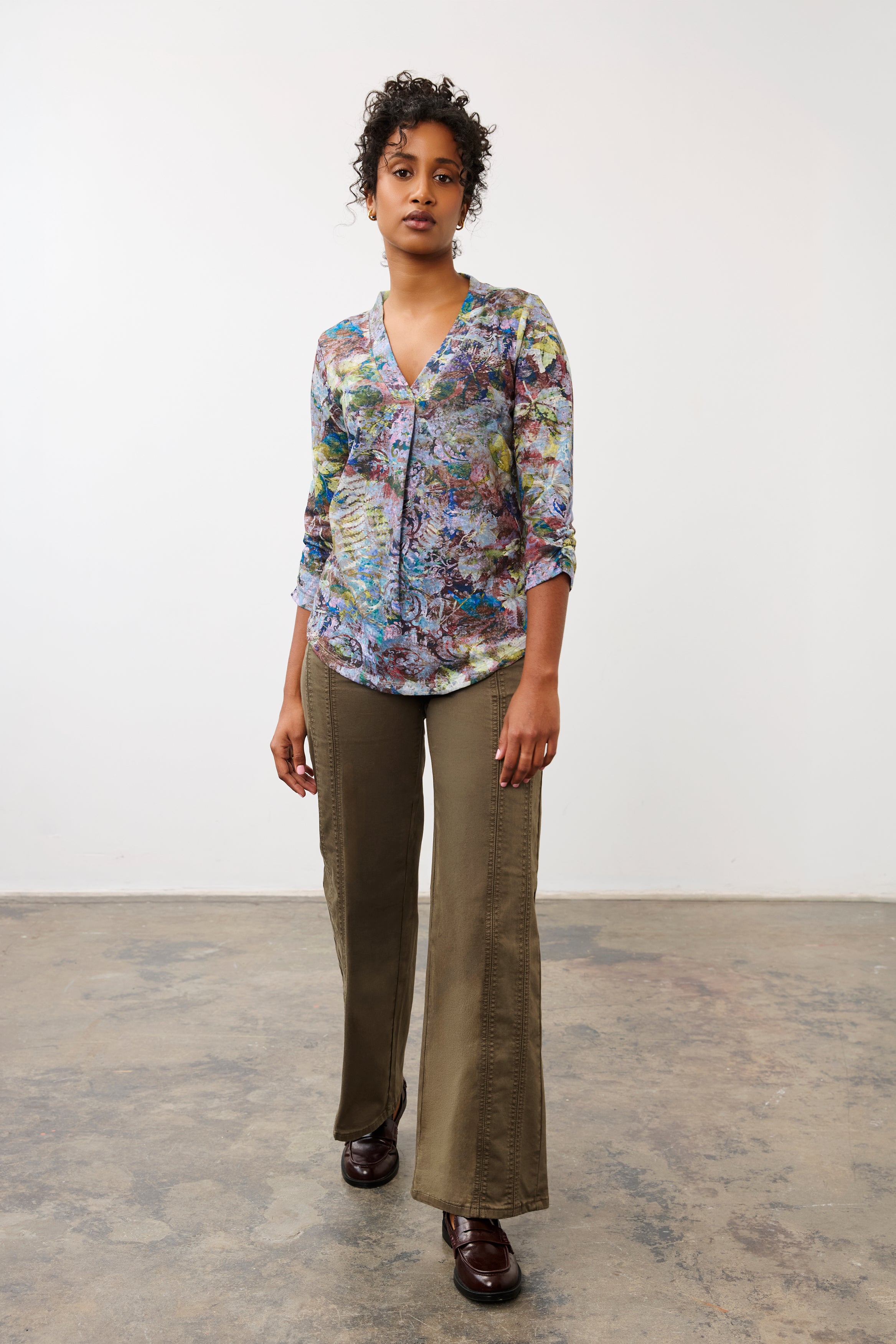 Full-body view of maple wide leg denim paired with floral blouse, showcasing fit and style by French Dressing Jeans (FDJ)