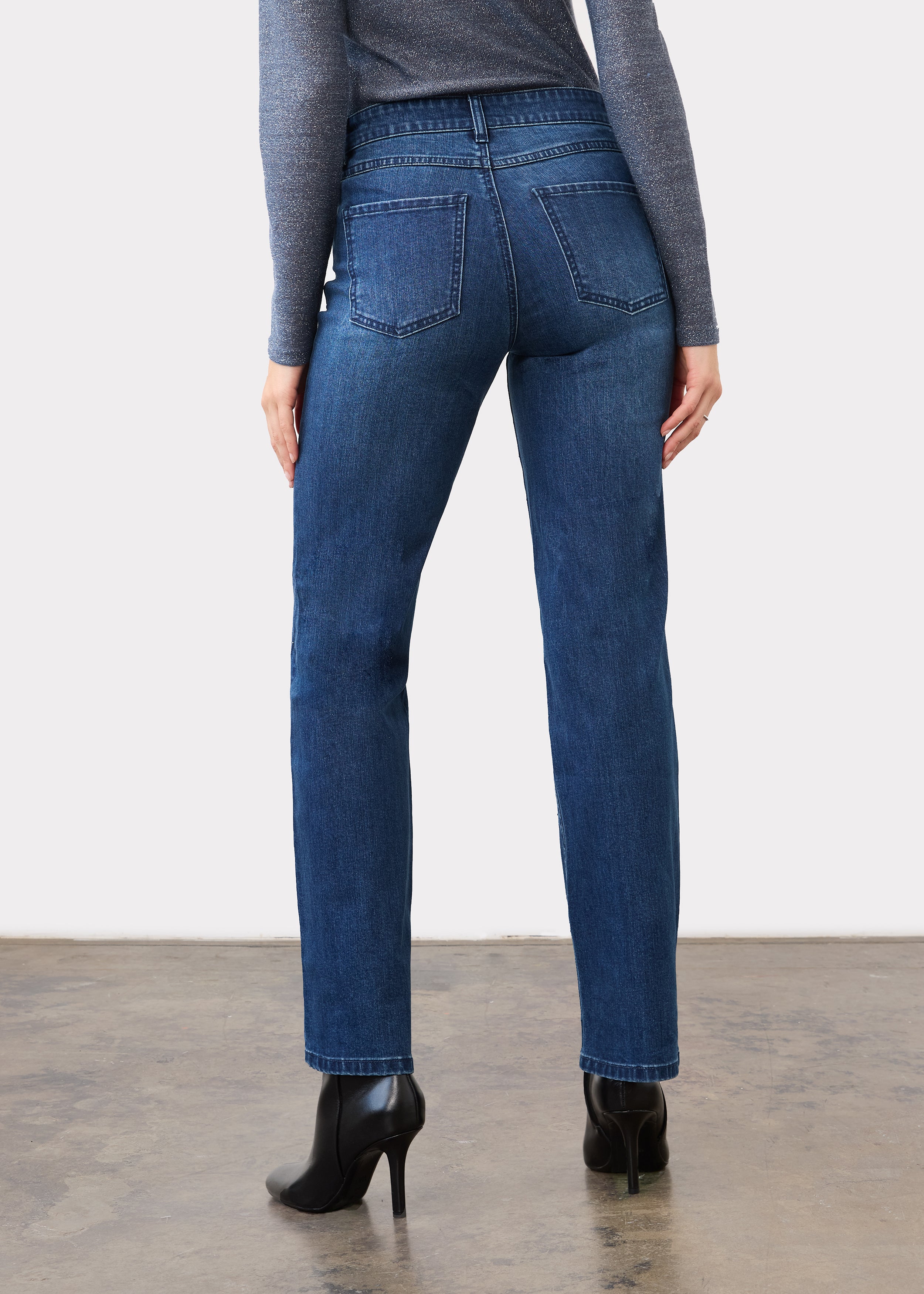 Back view of indigo jeans featuring patch pockets and slim straight leg by French Dressing Jeans (FDJ)