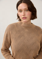 Close-up of tan textured top with high collar detail by French Dressing Jeans (FDJ)