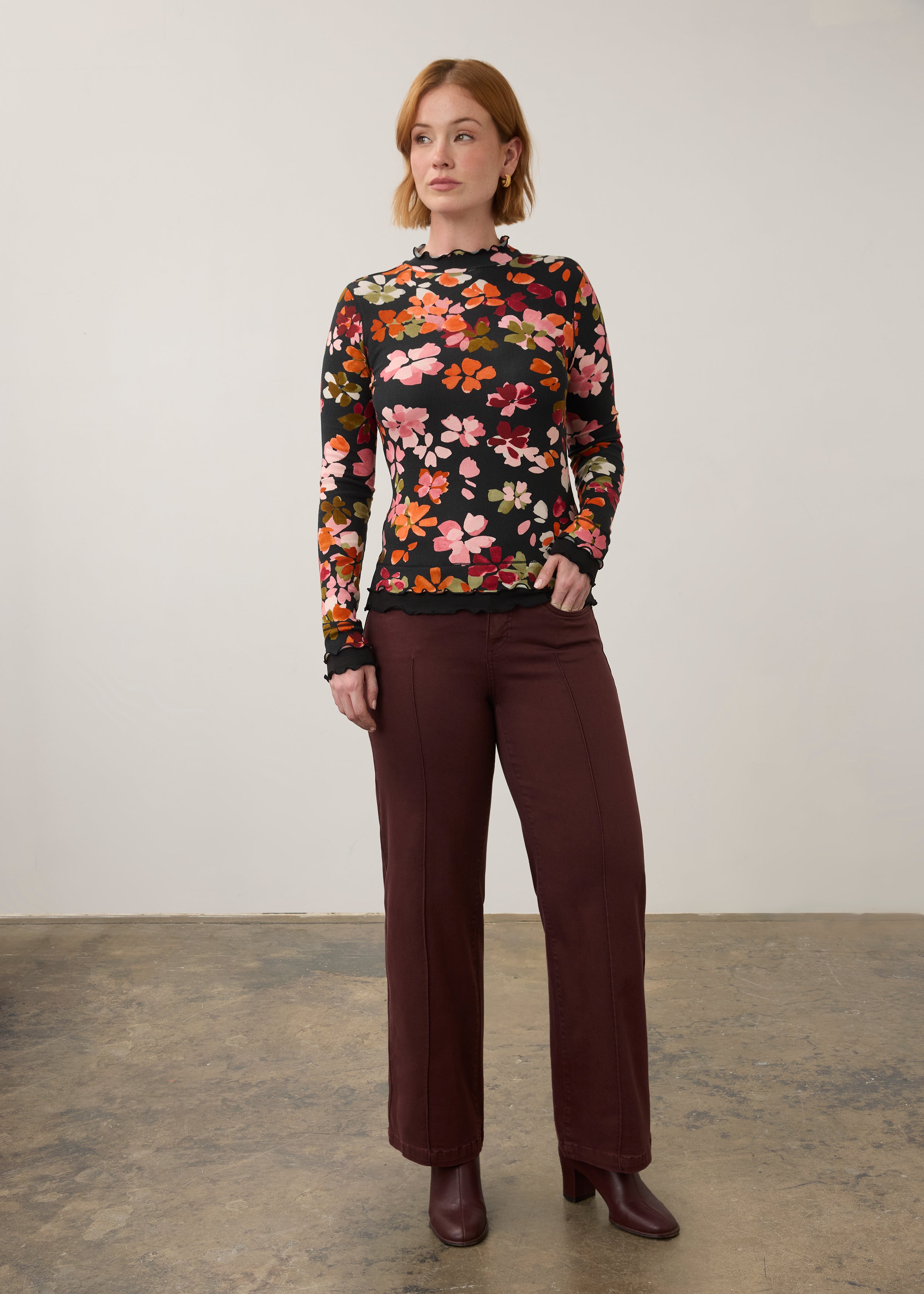 Full body view of vibrant floral top with maroon pants, stylish casual look by French Dressing Jeans (FDJ)